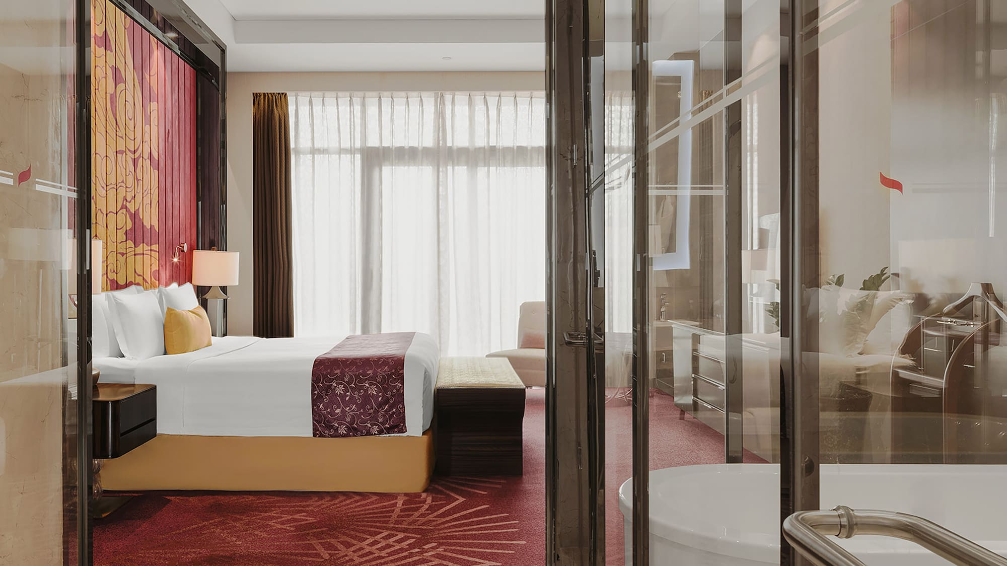 a bedroom with glass doors