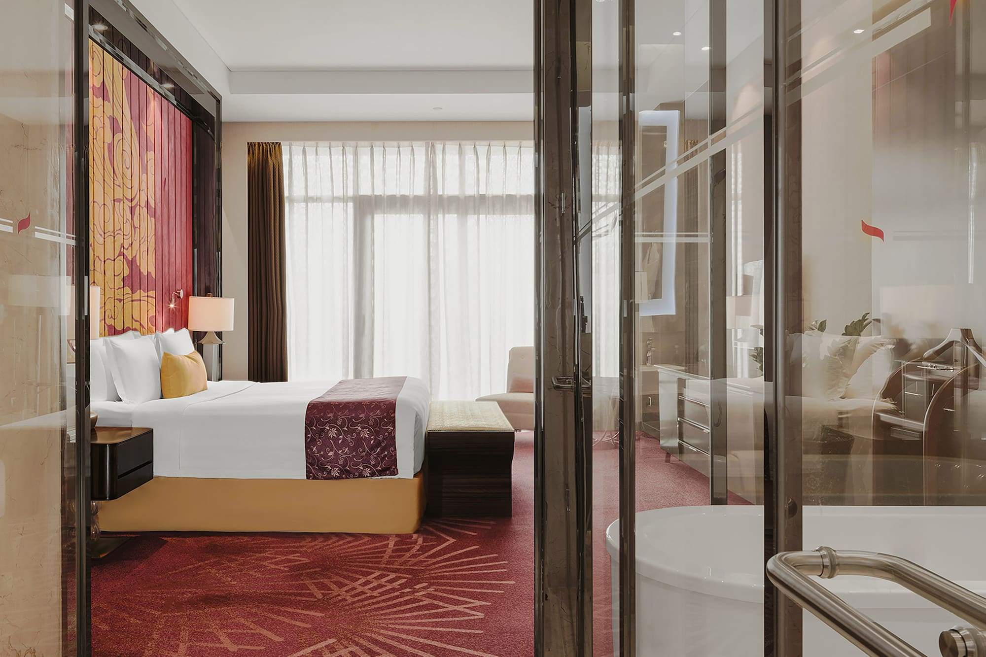 a bedroom with glass doors