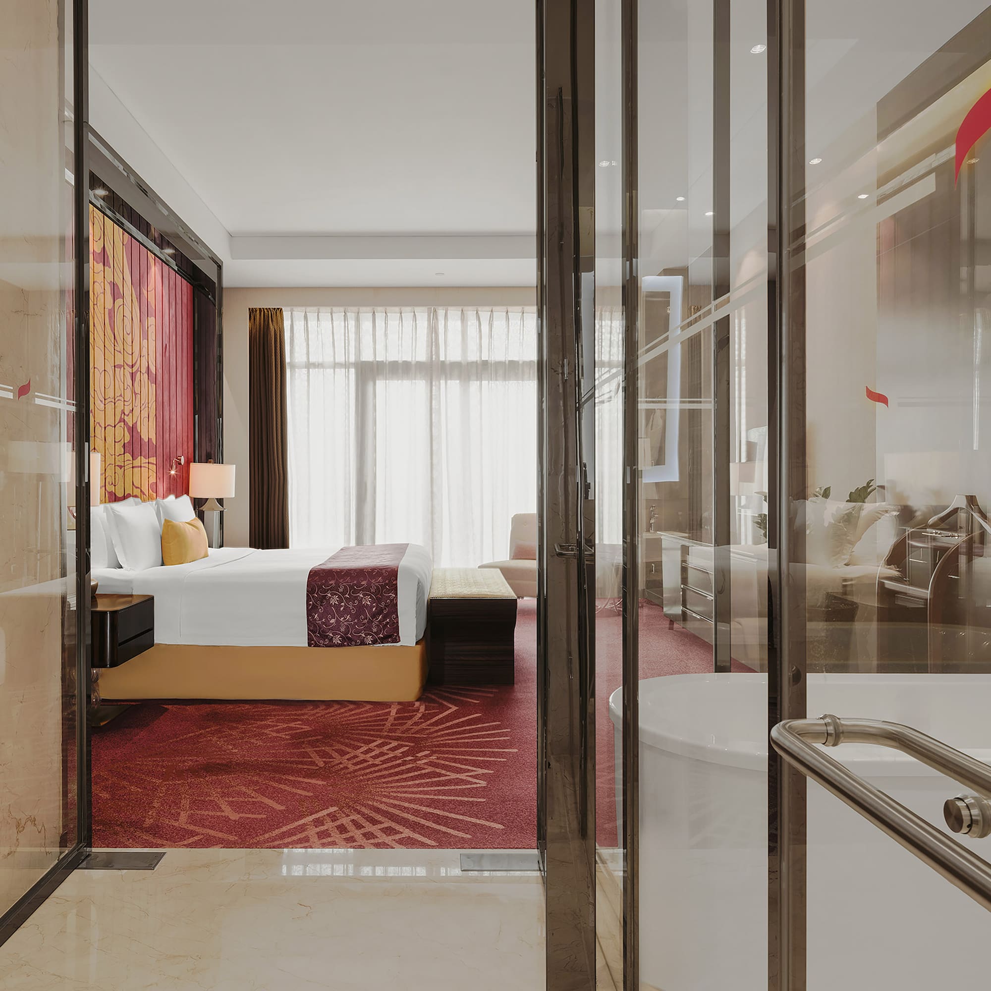 a bedroom with glass doors