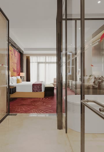 a bedroom with glass doors