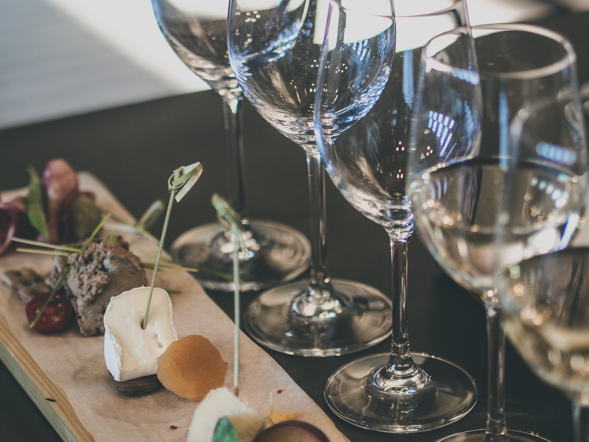 a group of wine glasses on a table