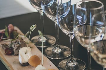 a group of wine glasses on a table