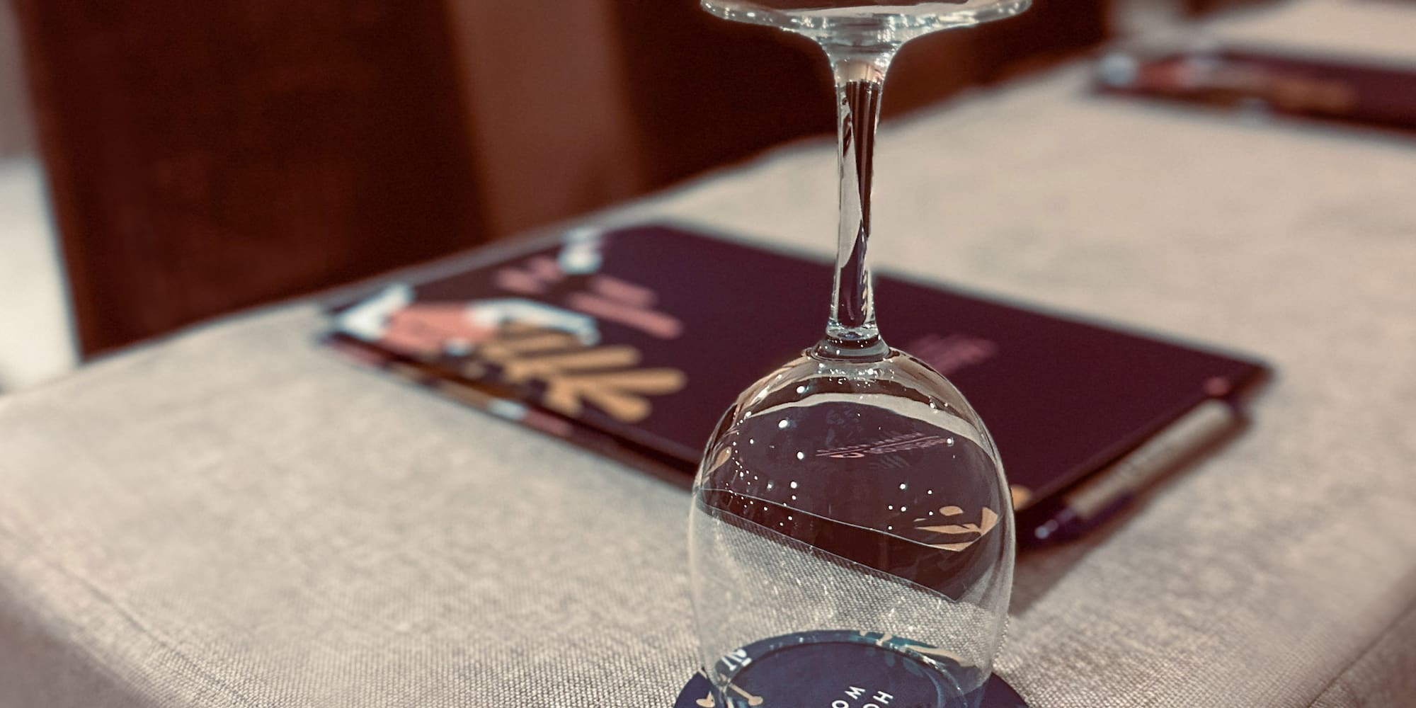 a wine glass on a table