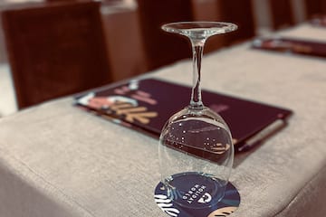 a wine glass on a table