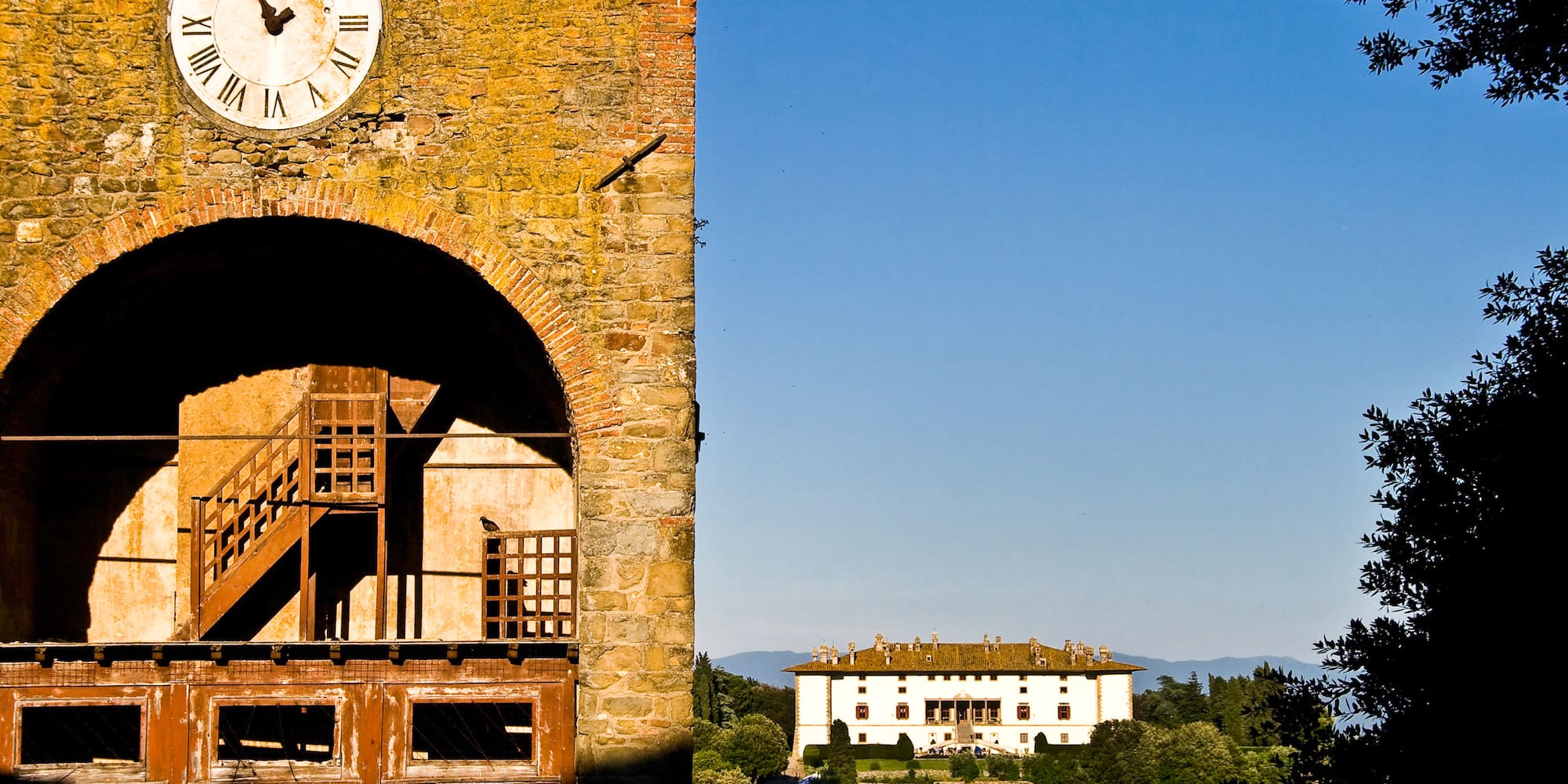 a clock on a brick tower