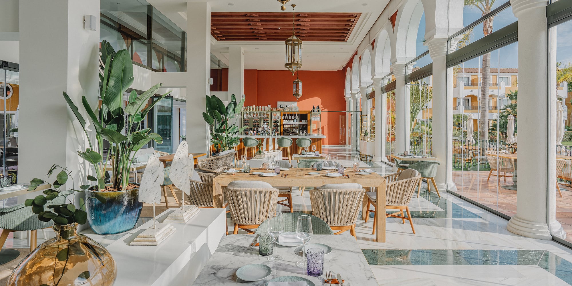 a restaurant with tables and chairs