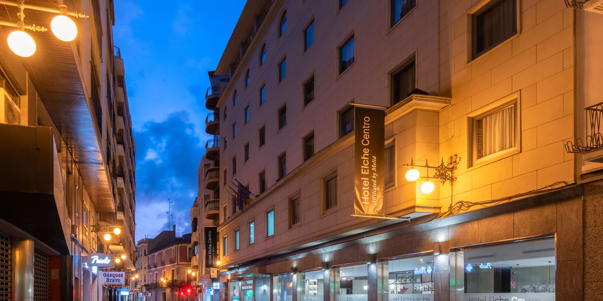 a street with buildings and signs