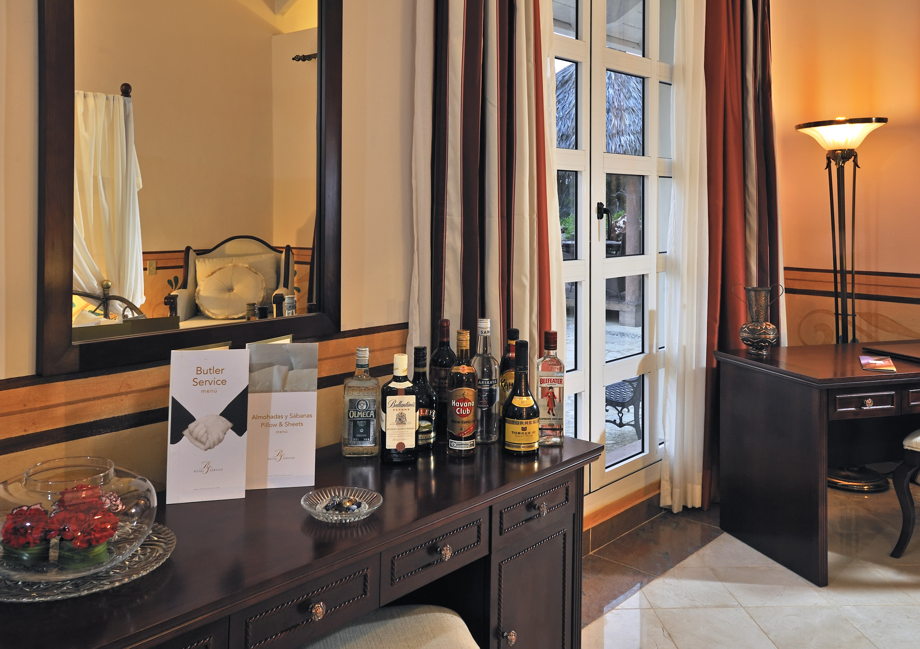 a table with bottles of alcohol on it