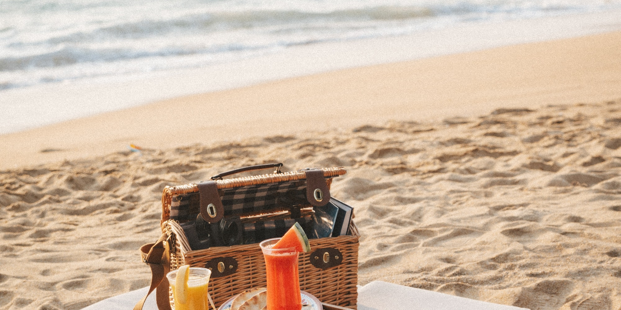 a picnic table on a beach
