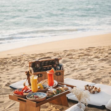 a picnic table on a beach