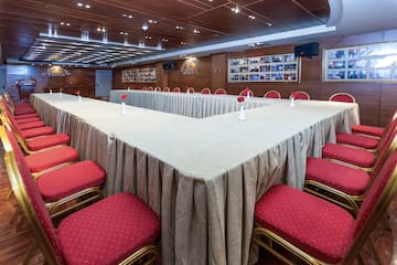 a room with tables and chairs