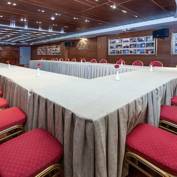 a room with tables and chairs