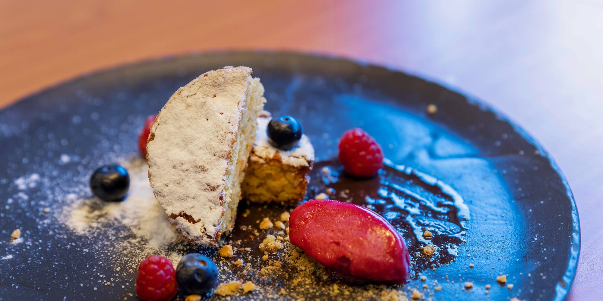 a plate of food with berries on it