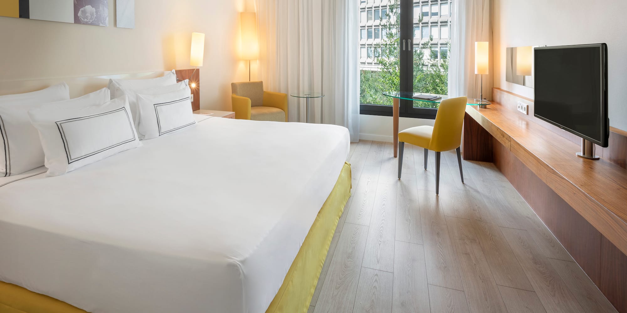 a room with a bed and a desk