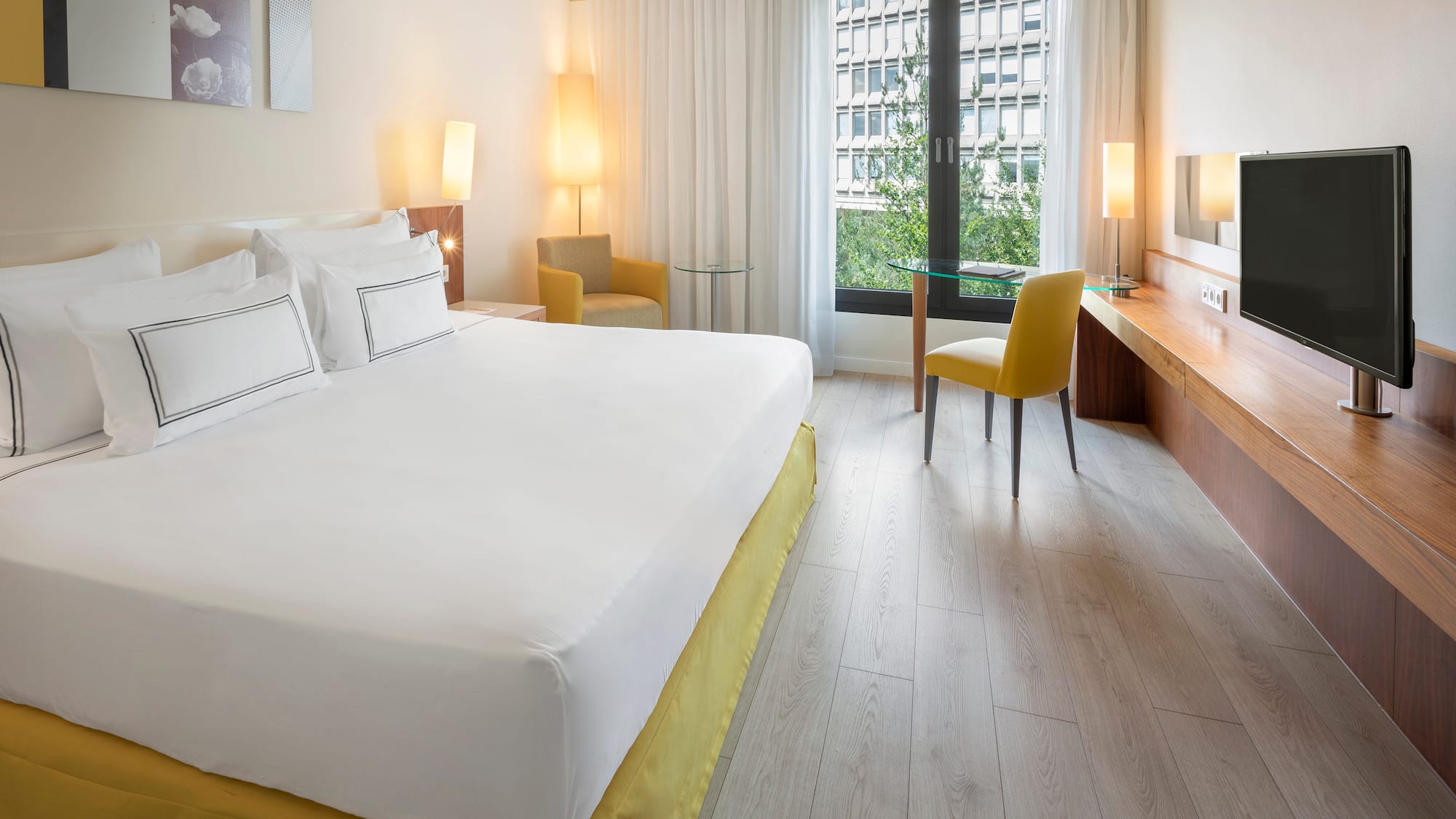 a room with a bed and a desk