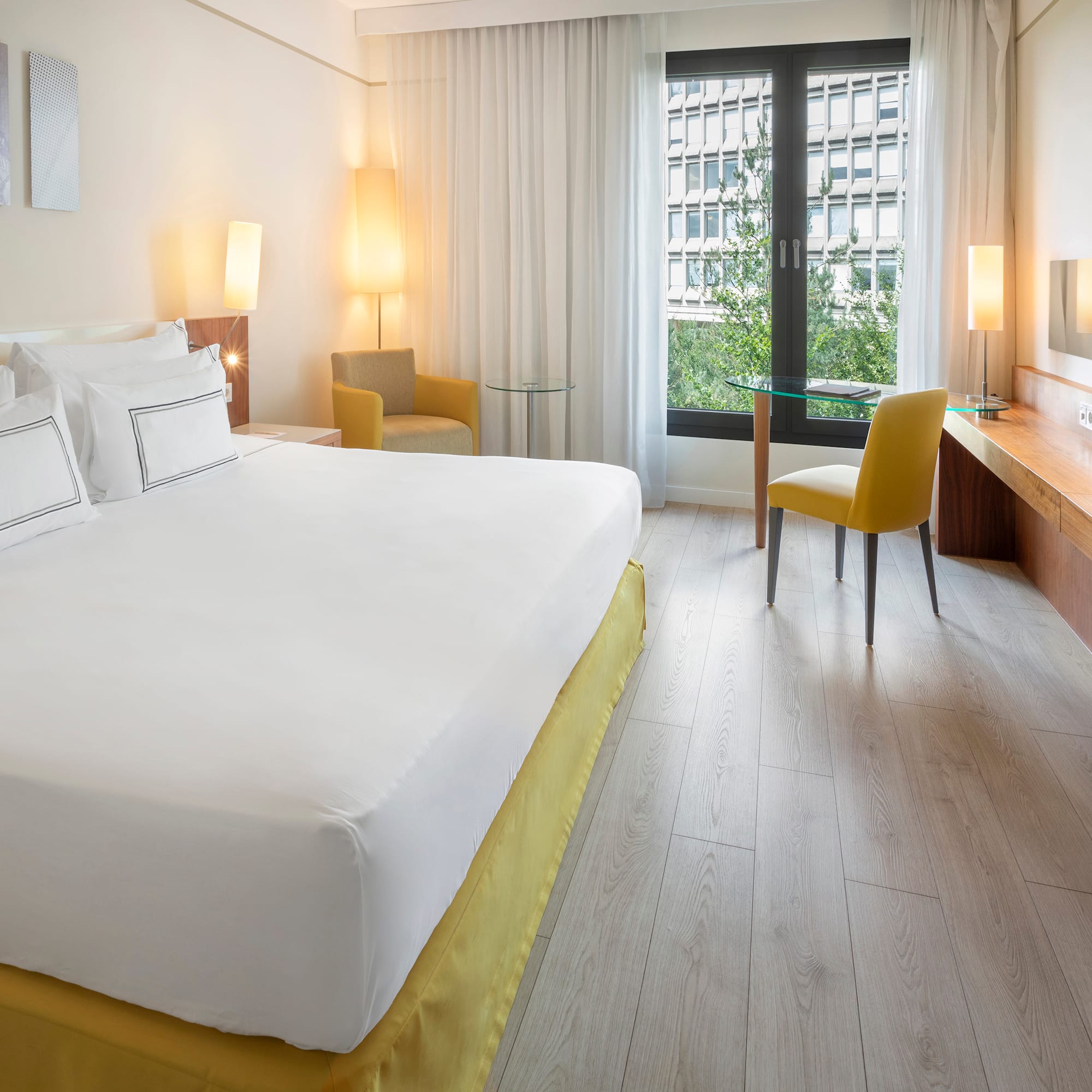 a room with a bed and a desk