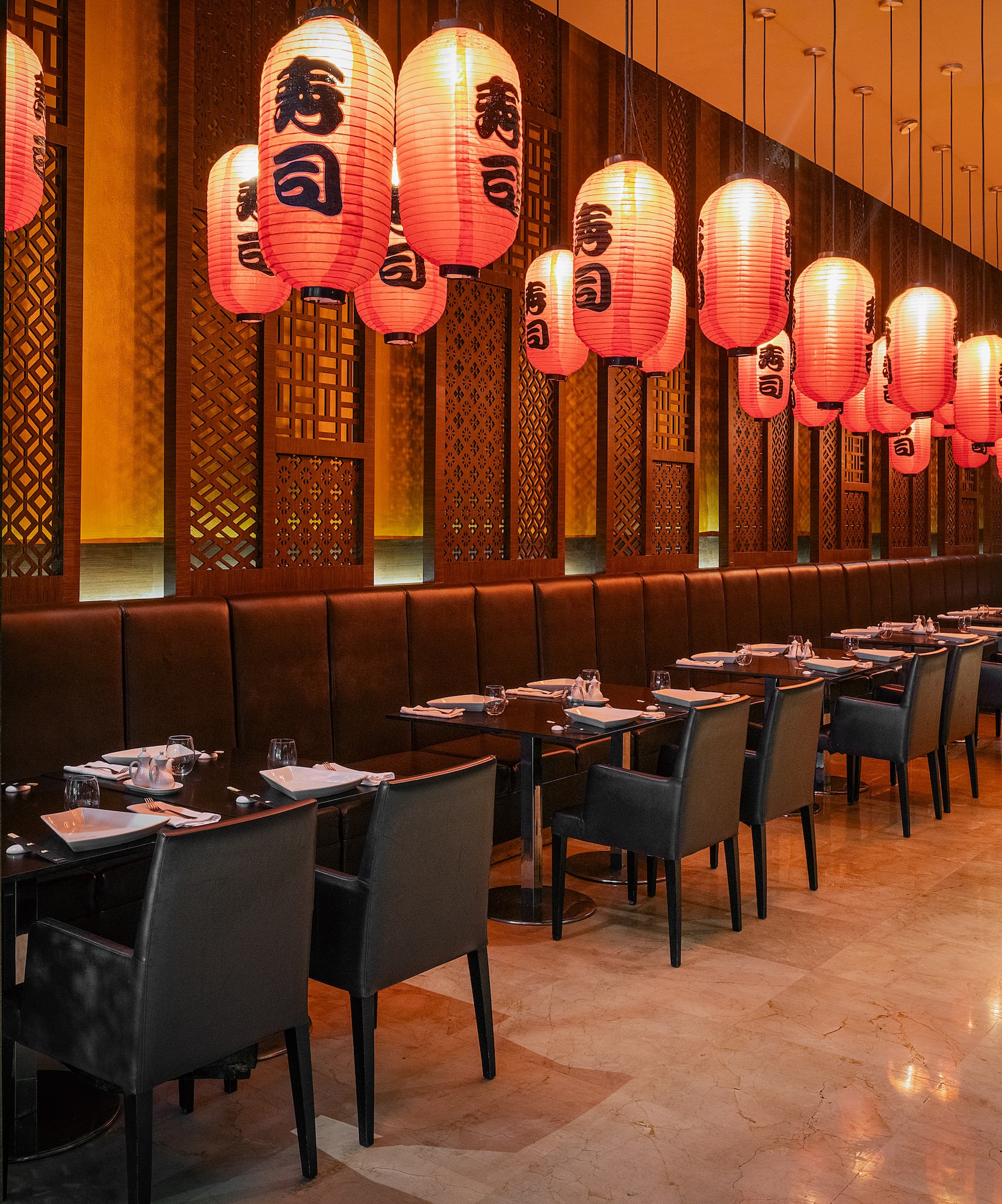 a restaurant with tables and chairs