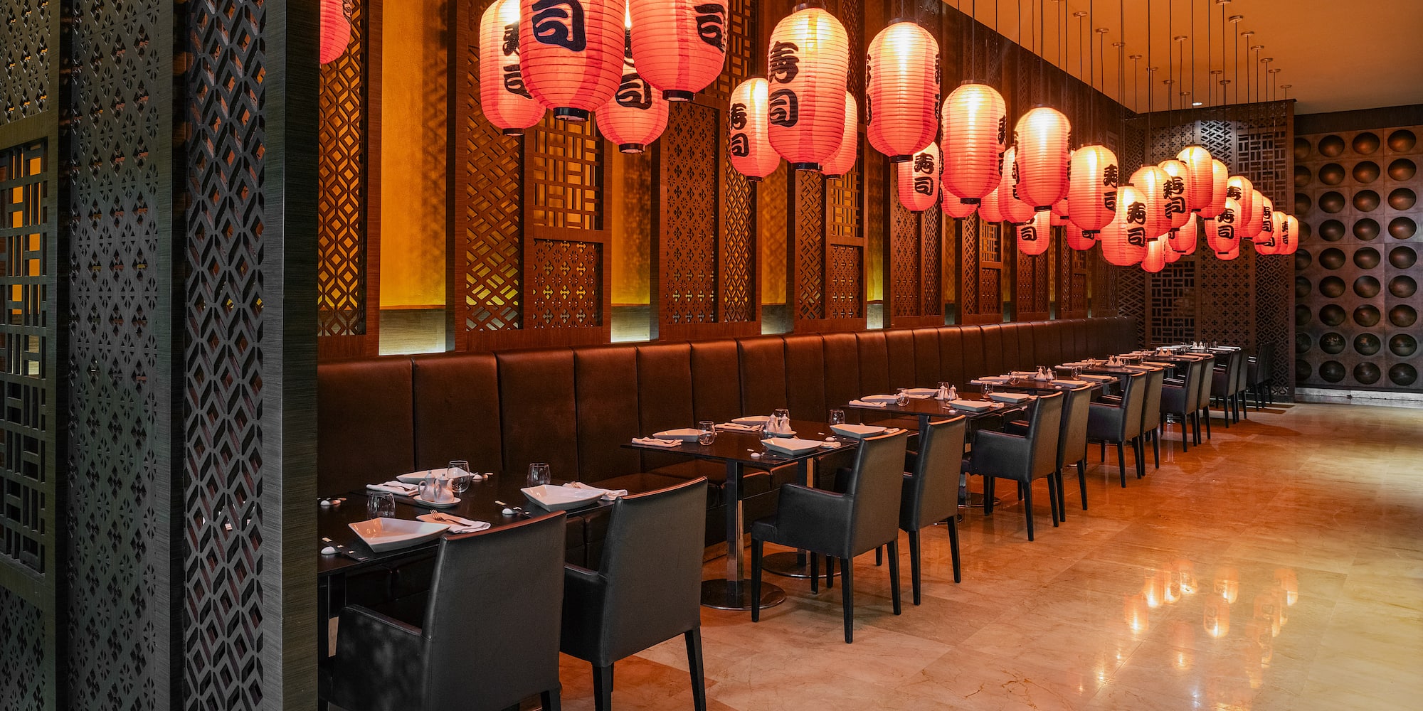 a restaurant with tables and chairs