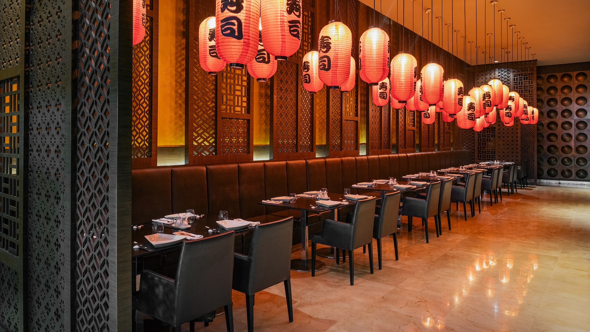 a restaurant with tables and chairs