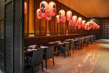 a restaurant with tables and chairs