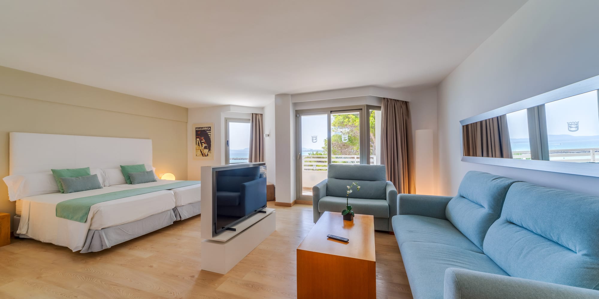 a room with a television and couches