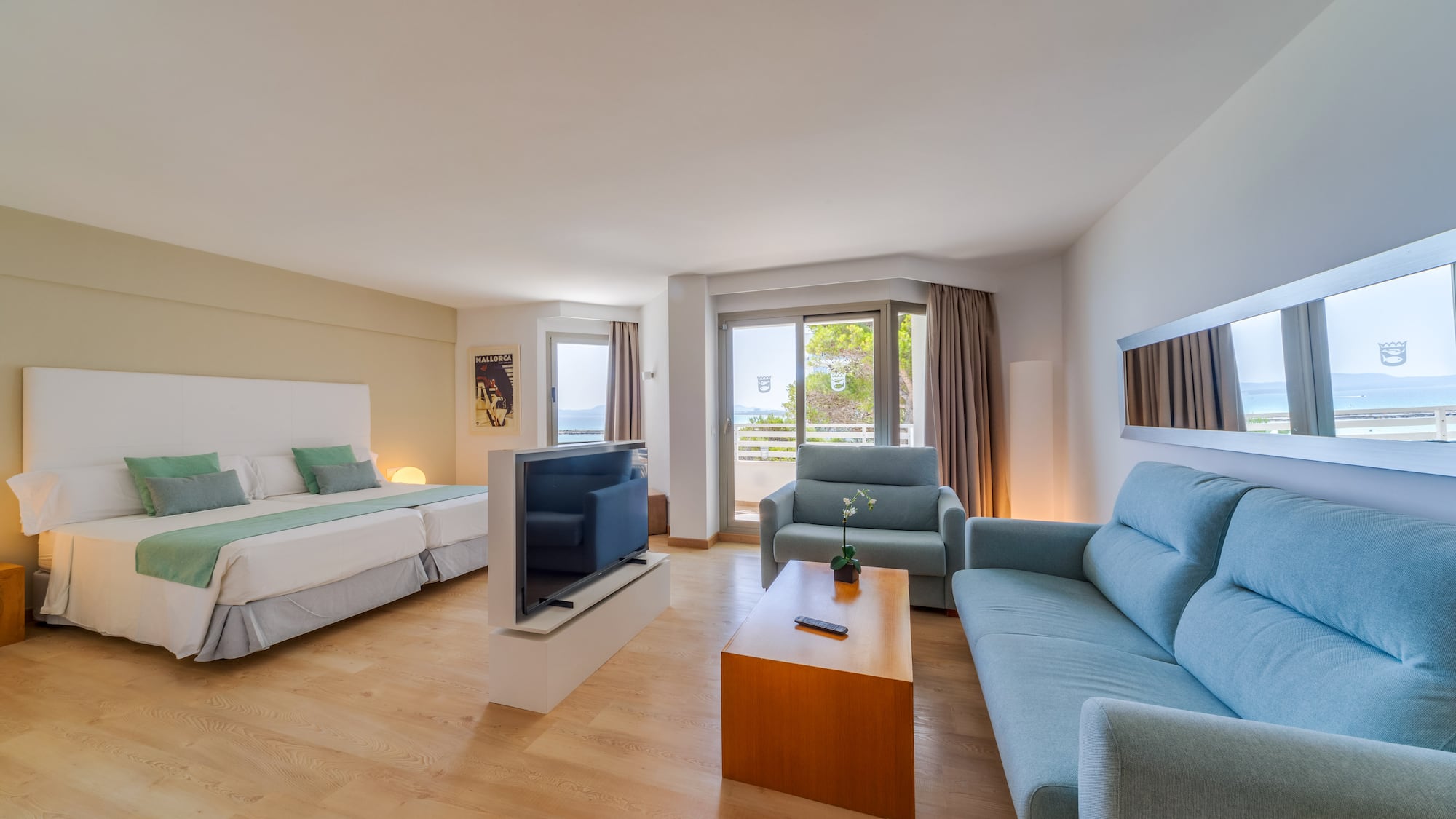 a room with a television and couches