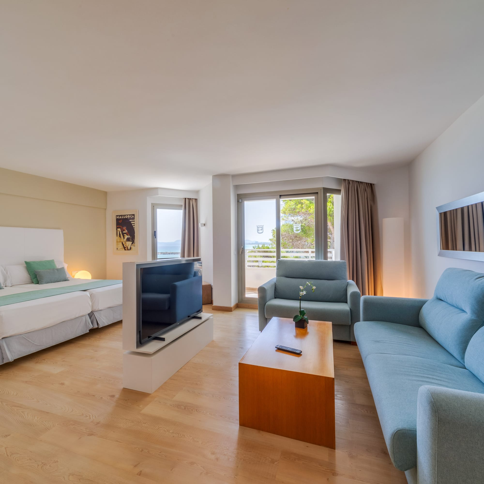 a room with a television and couches