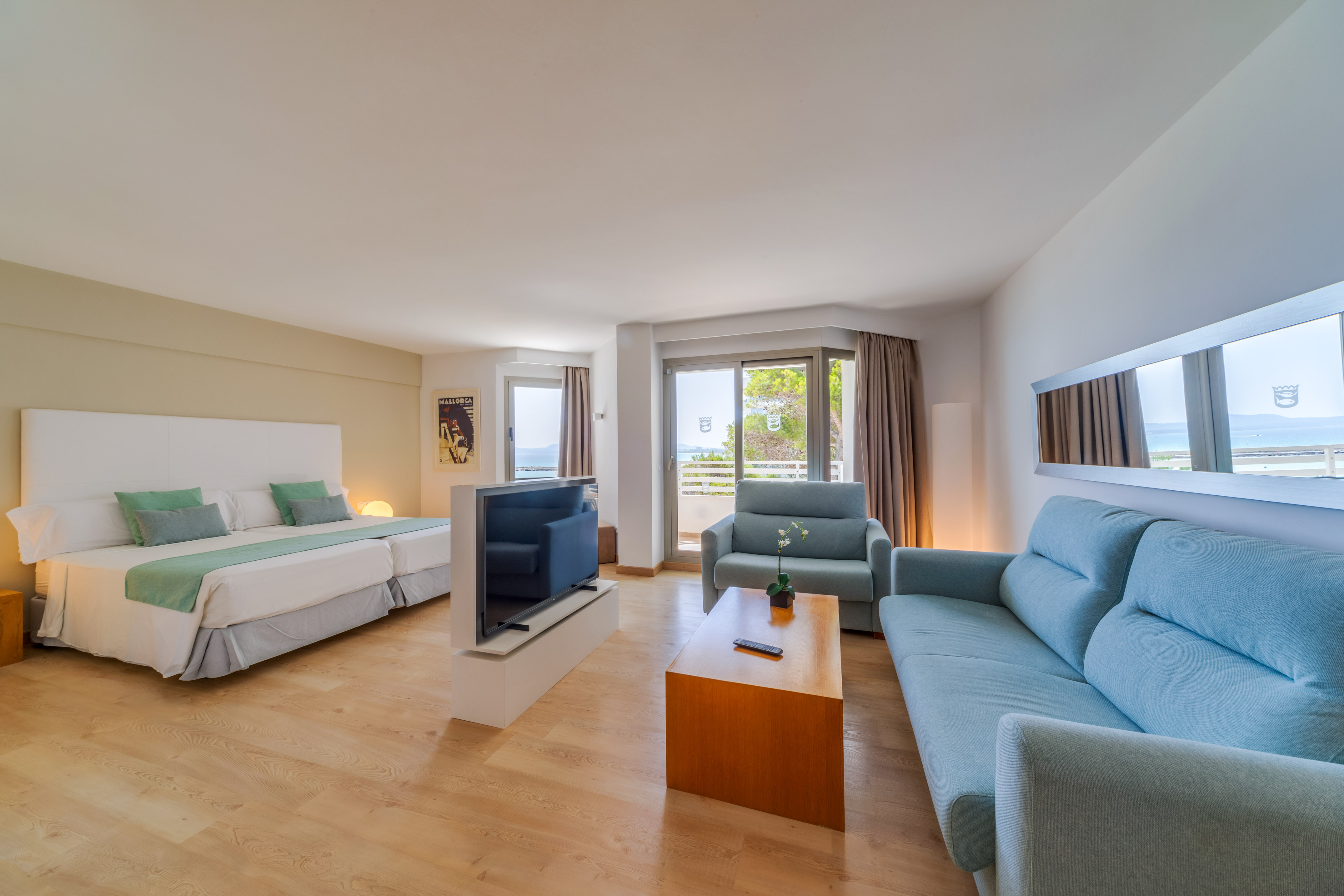 a room with a television and couches