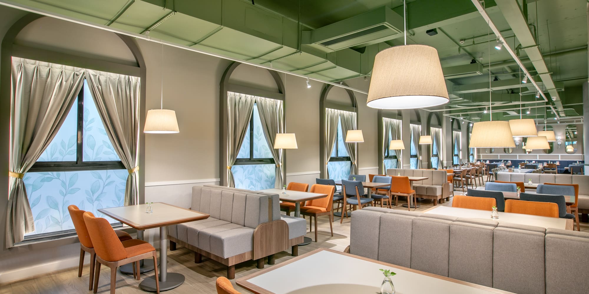 a room with tables and chairs