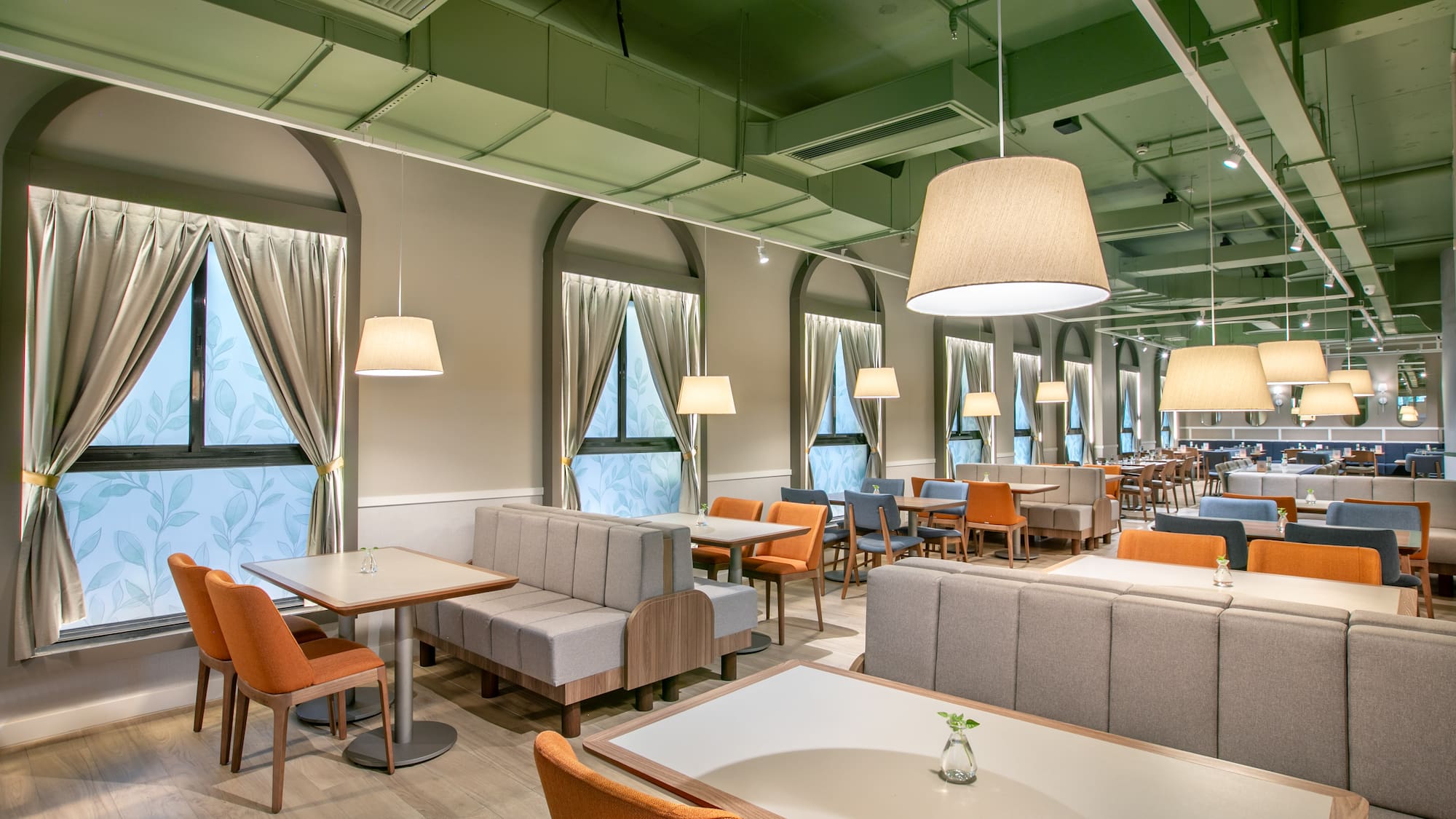 a room with tables and chairs