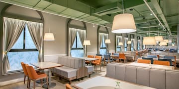 a room with tables and chairs