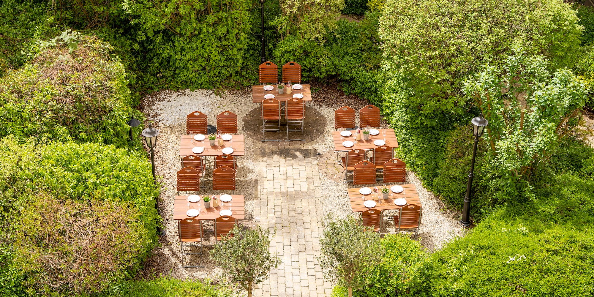 a table and chairs in a garden