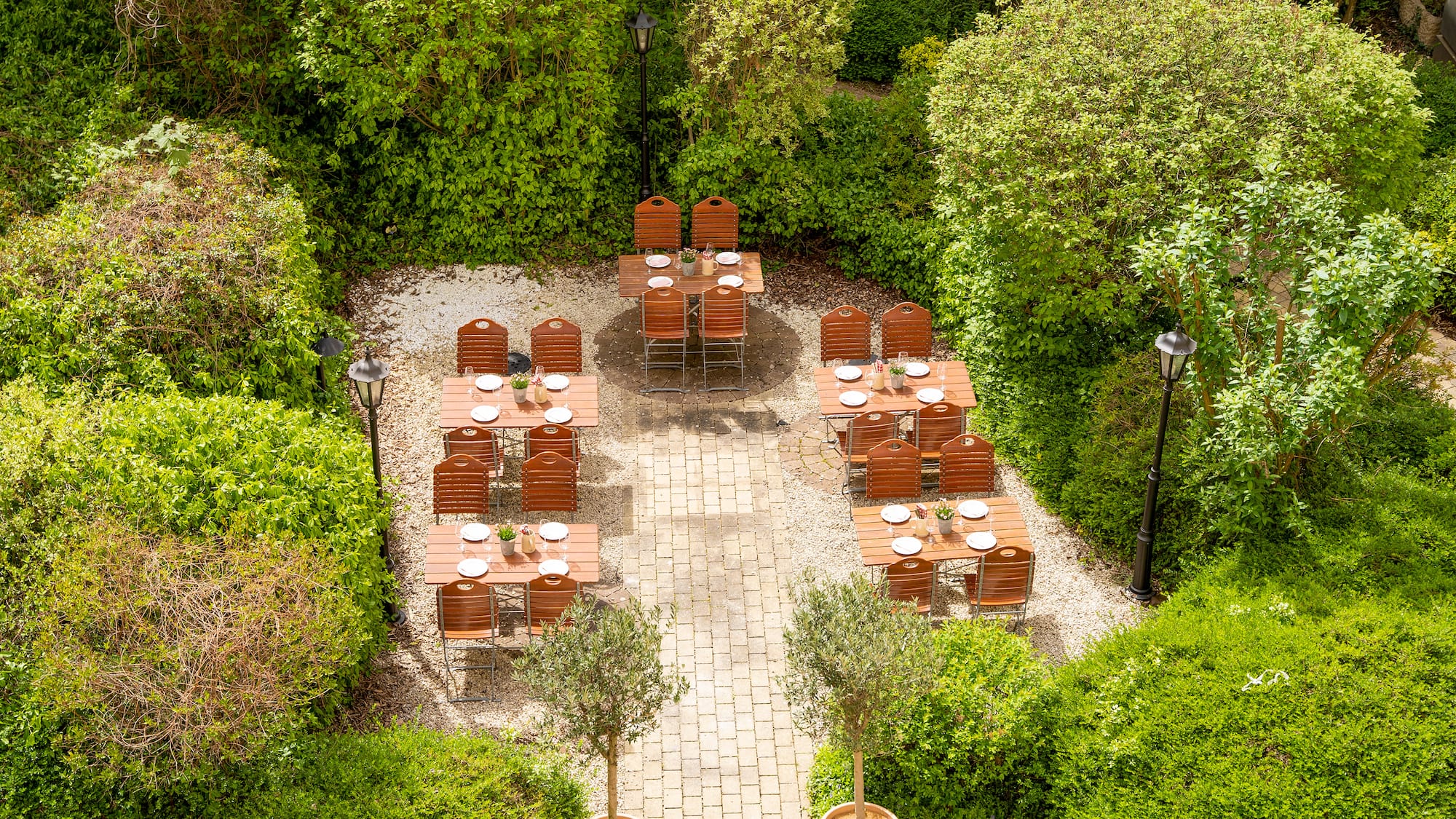 a table and chairs in a garden