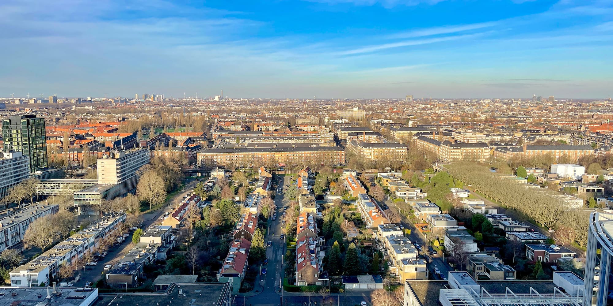 a city with many buildings and trees