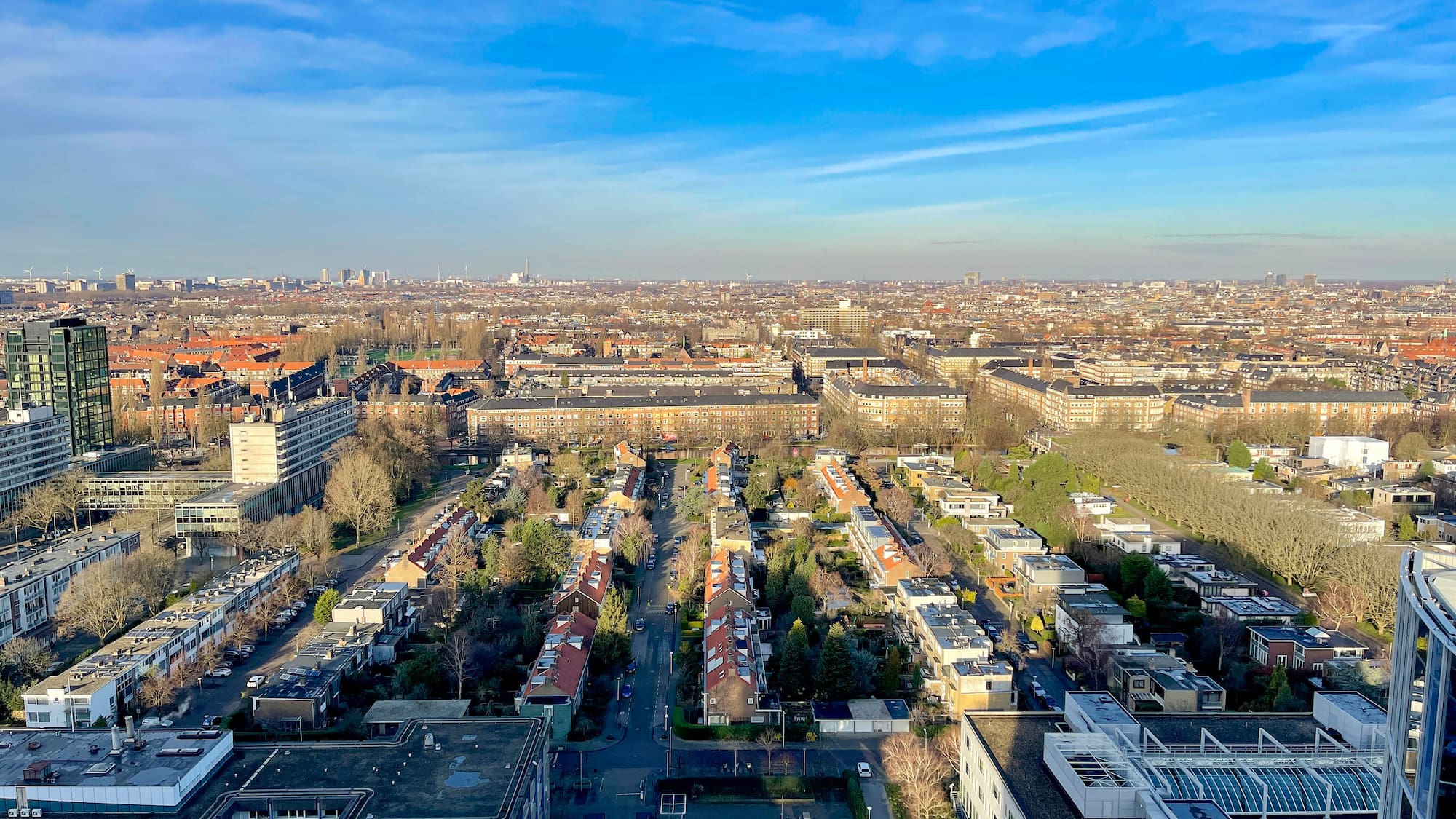 a city with many buildings and trees