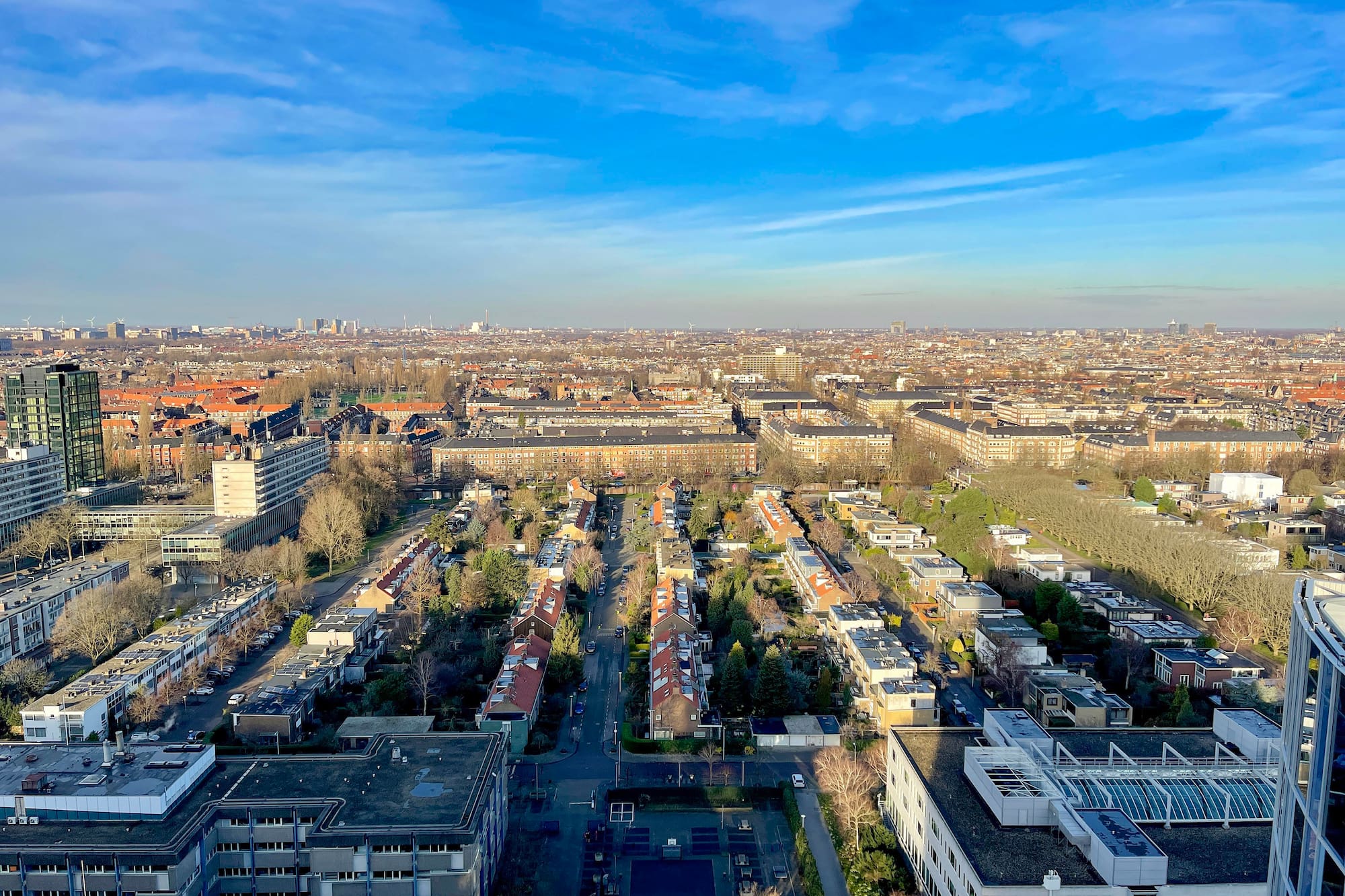 a city with many buildings and trees