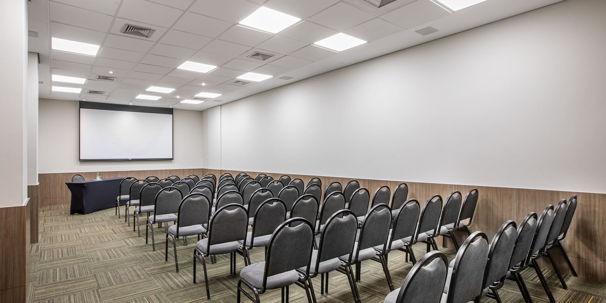 a room with rows of chairs