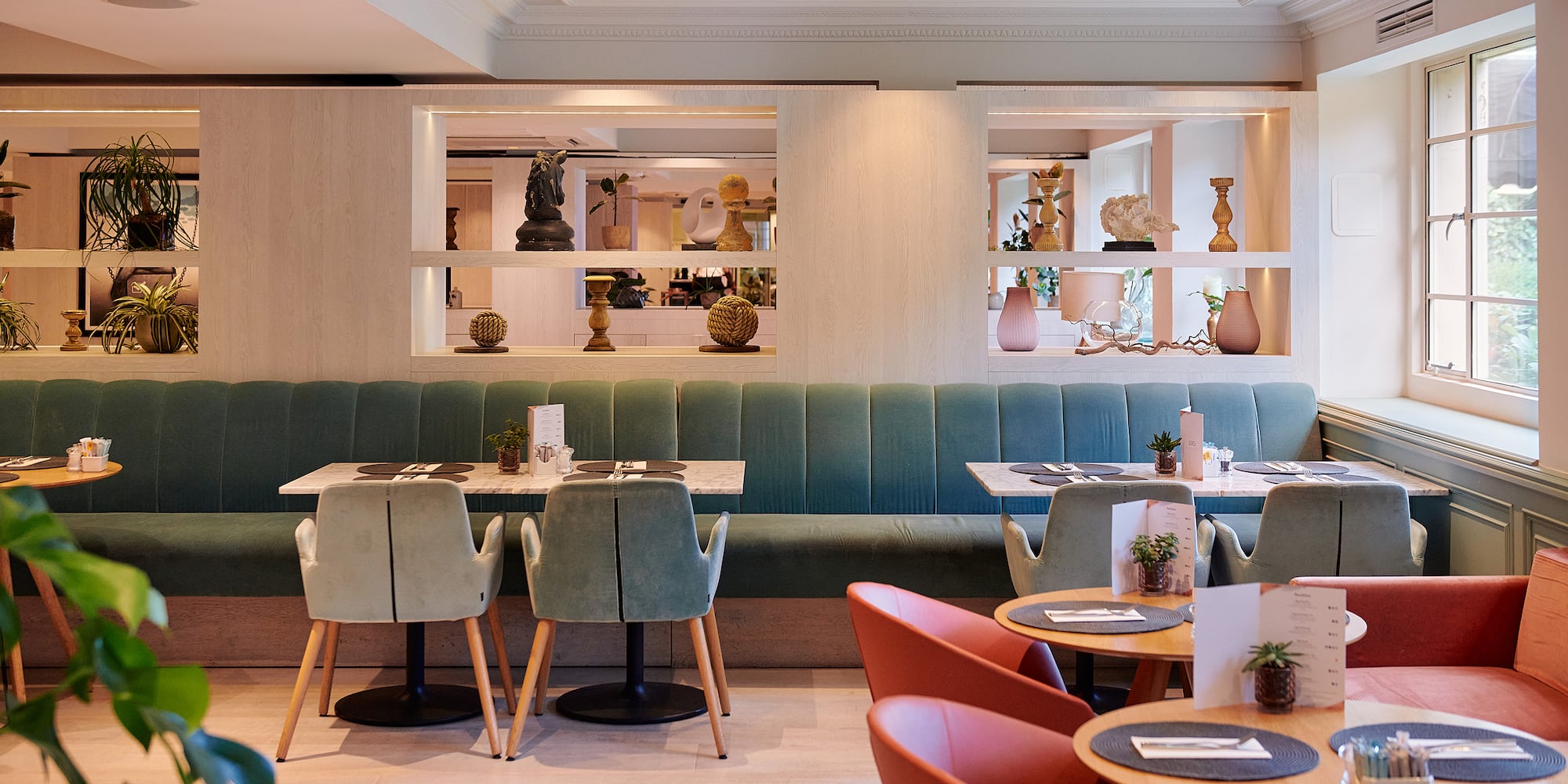 a restaurant with tables and chairs