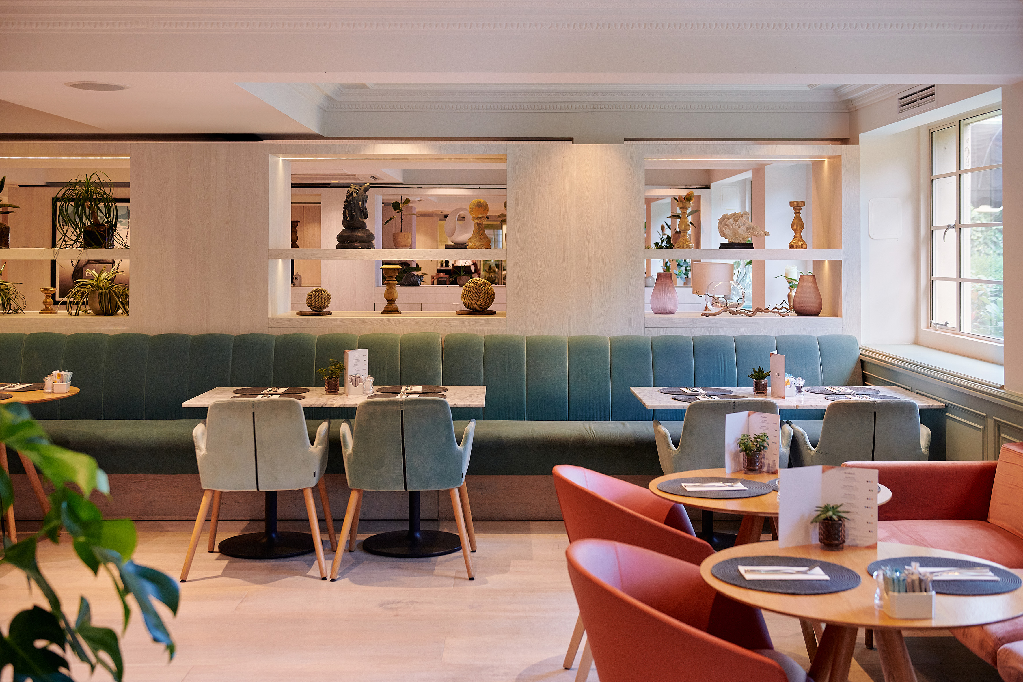 a restaurant with tables and chairs