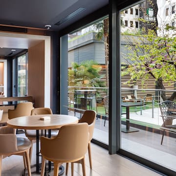 a room with a table and chairs