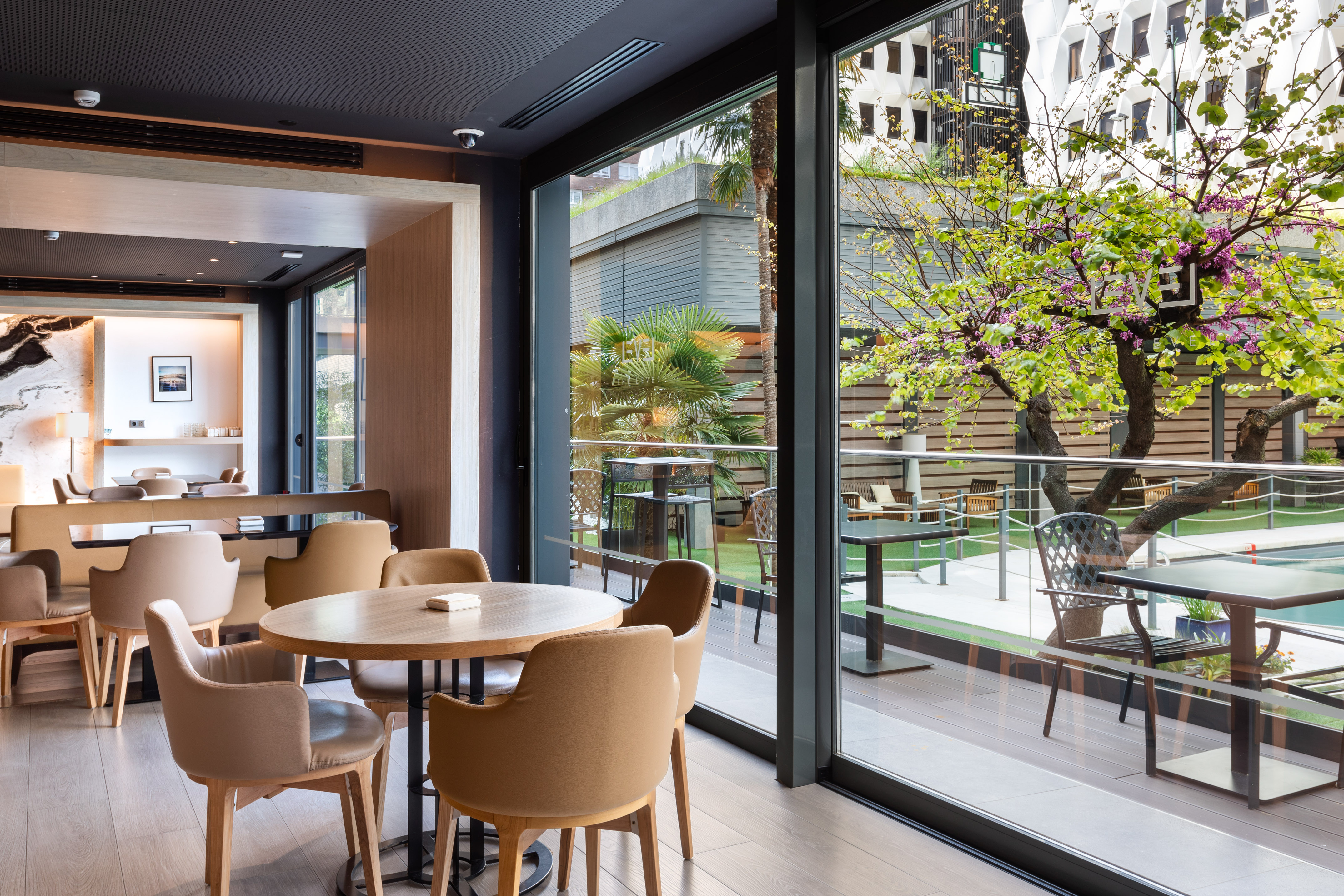 a room with a table and chairs