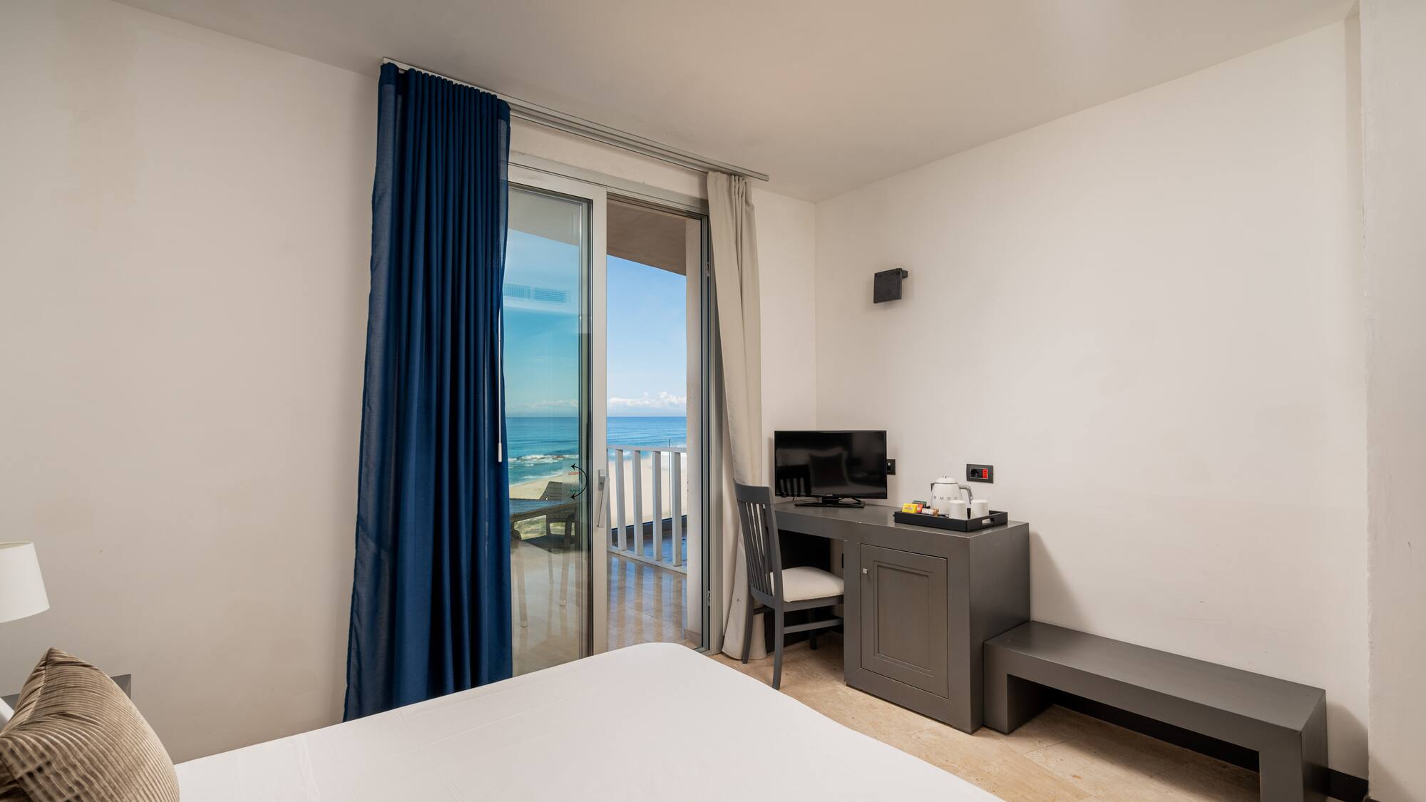 a room with a desk and a computer