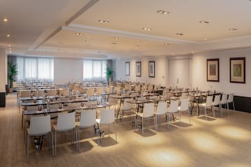 a room with tables and chairs