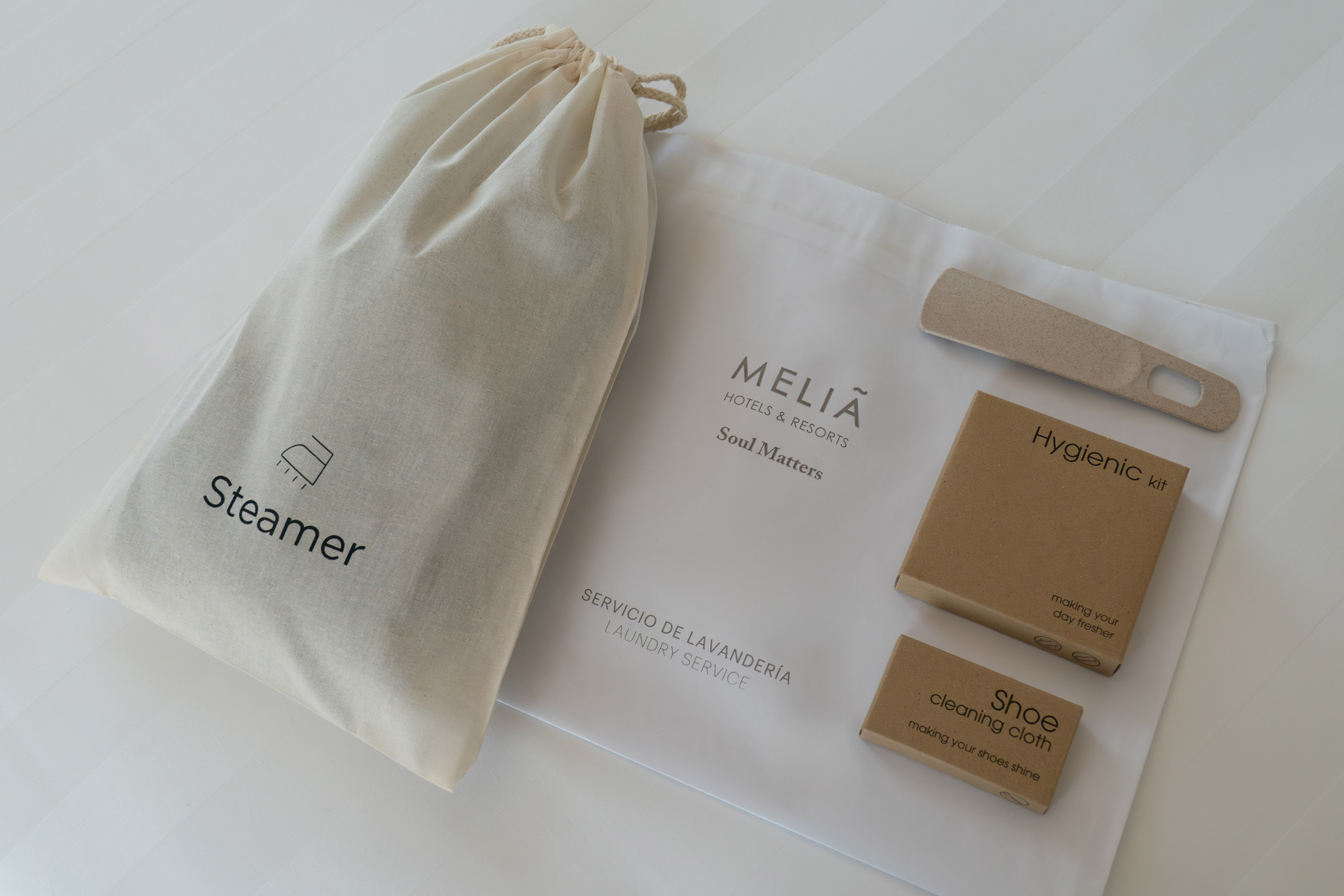 Meliá hotel amenities: laundry service, steamer bag, shoe care kit, hygienic kit.