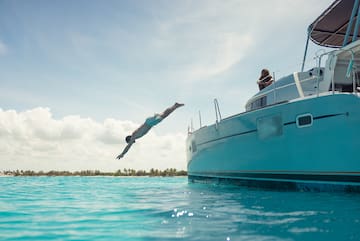 a man jumping into the water