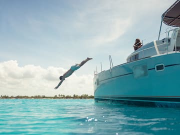 a man jumping into the water