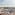 Madrid panorama with Royal Palace, Almudena Cathedral, and rooftops.