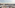 Madrid panorama with Royal Palace, Almudena Cathedral, and rooftops.