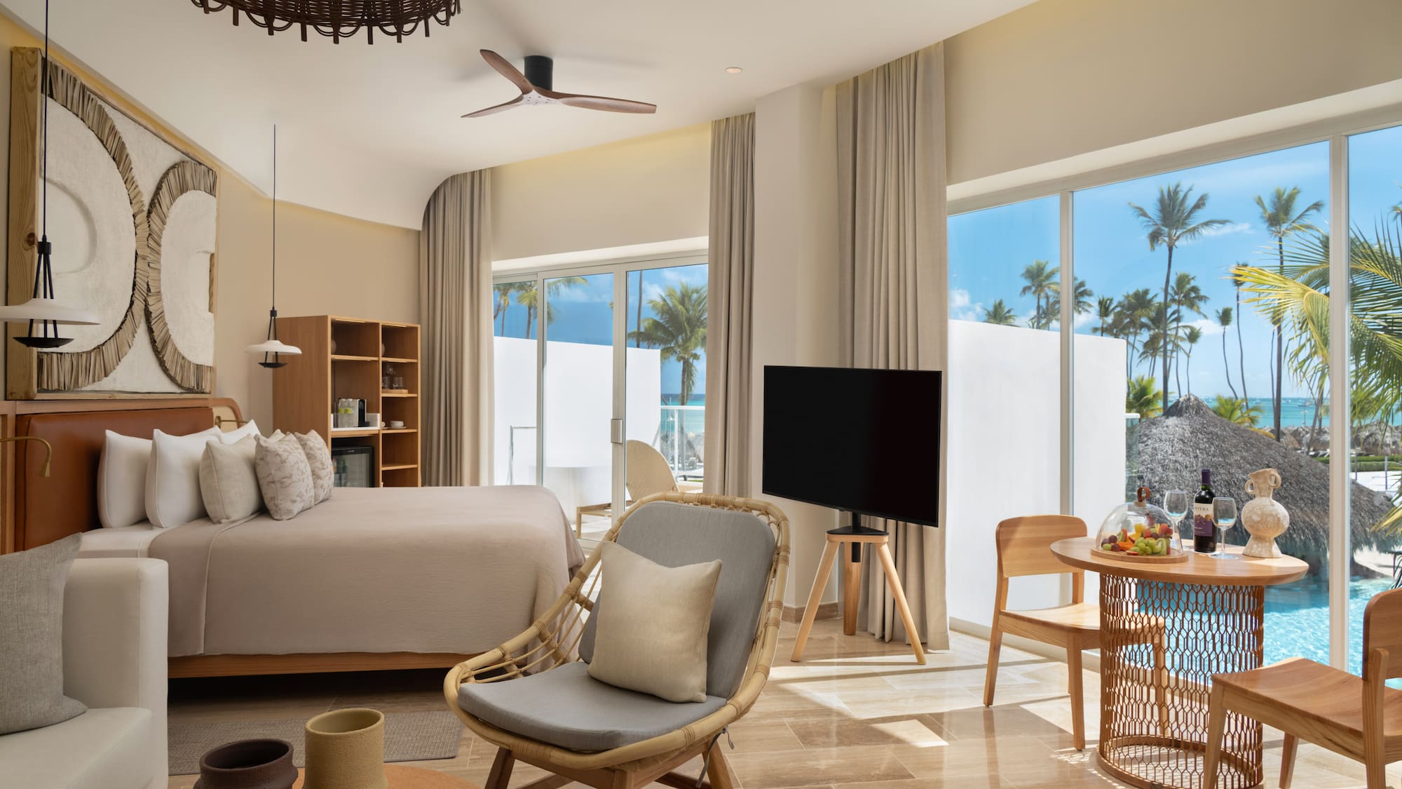 a room with a bed and a television