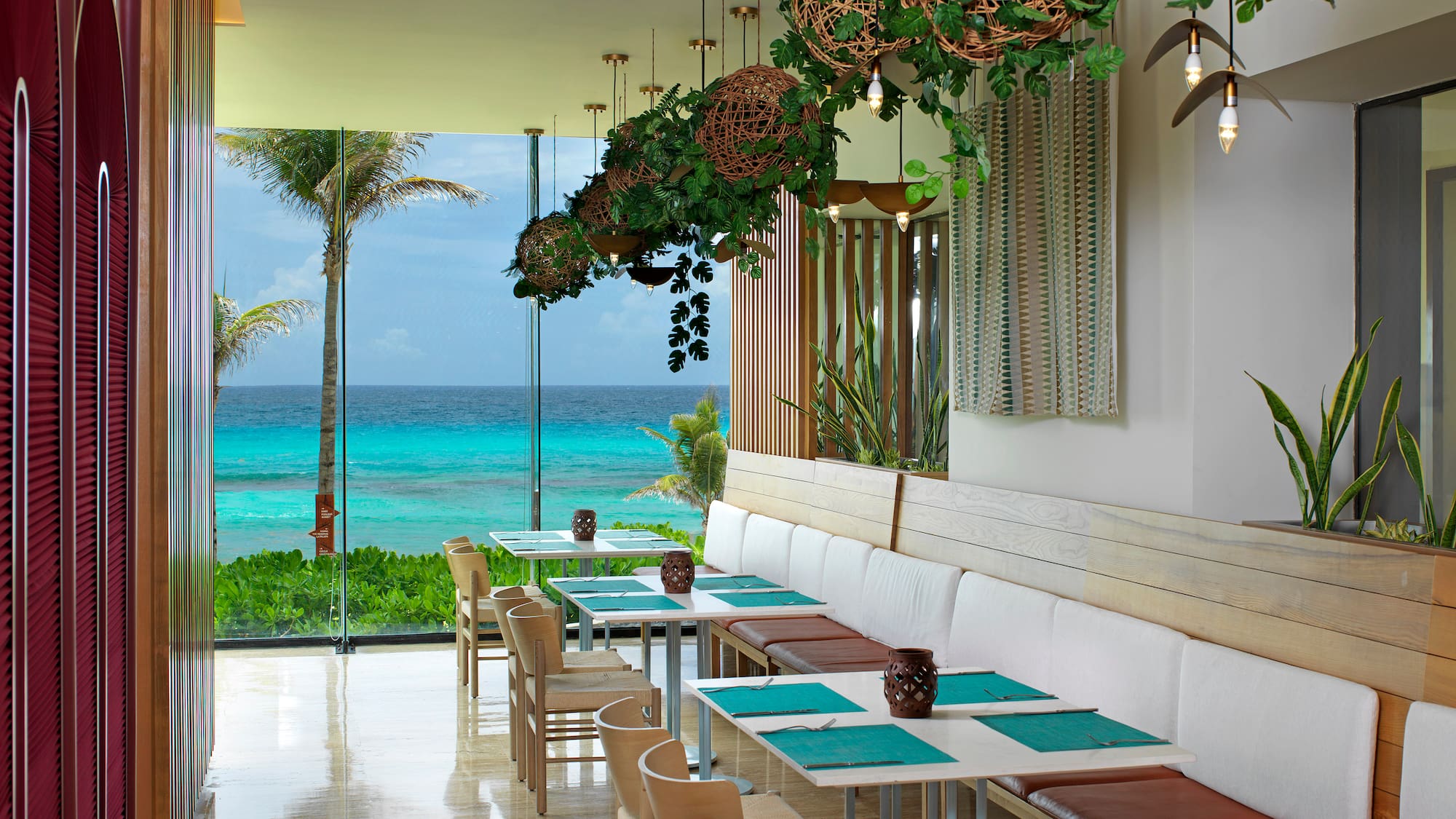 a restaurant with a view of the ocean